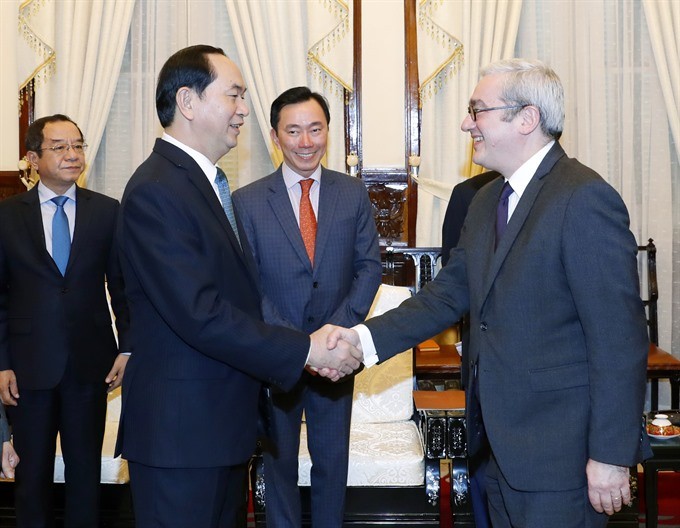 President Tran Dai Quang meets Emmanuel Hoog, chairman and chief executive of the Agence France-Presse (AFP). (Photo: VNA/VNS) President Tran Dai Quang meets Emmanuel Hoog, chairman and chief executive of the Agence France-Presse (AFP). (Photo: VNA/VNS)